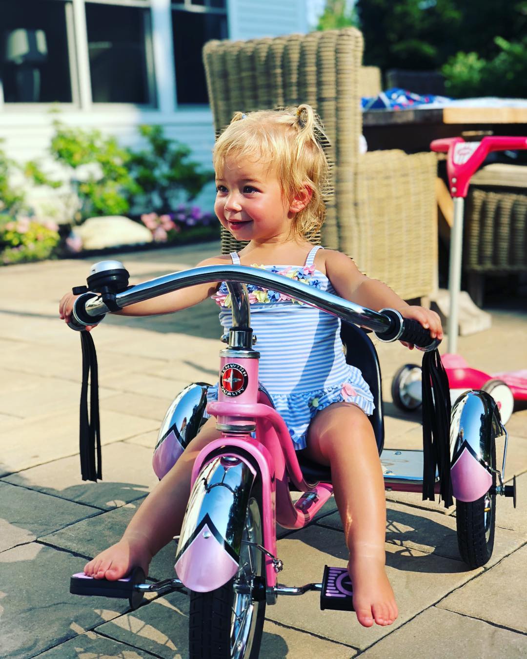 Blake on a tricycle gifted on her birthday